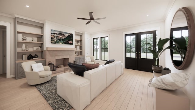 4935 Ward Bend Rd, Sealy, TX 77474 - living room with french doors, ceiling fan, crown molding, light wood-style floors, and a fireplace