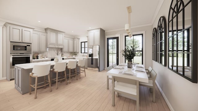 4935 Ward Bend Rd, Sealy, TX 77474 - dining area featuring light wood-style floors, crown molding, and recessed lighting