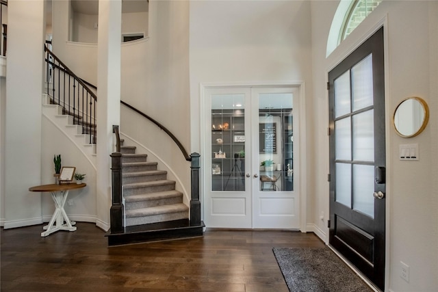 4209 Orchard Pass Dr, Spring, TX 77386 - entryway with a high ceiling, stairway, french doors, and dark wood-type flooring