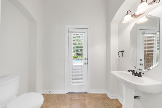 3207 W Benders Landing Blvd, Spring, TX 77386 - bathroom with toilet and baseboards