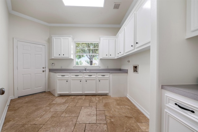 3207 W Benders Landing Blvd, Spring, TX 77386 - laundry area with washer hookup, stone tile flooring, ornamental molding, and cabinet space
