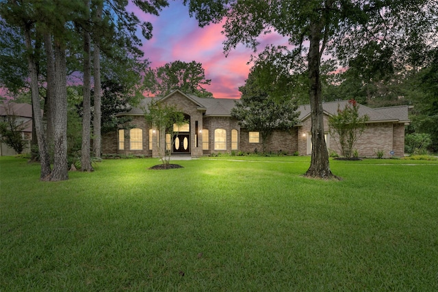 3207 W Benders Landing Blvd, Spring, TX 77386 - view of front of property featuring a front lawn and brick siding