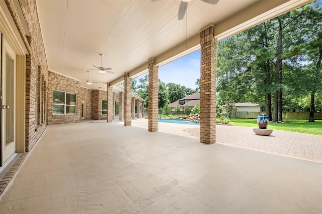 3207 W Benders Landing Blvd, Spring, TX 77386 - fenced backyard with a ceiling fan and a patio area