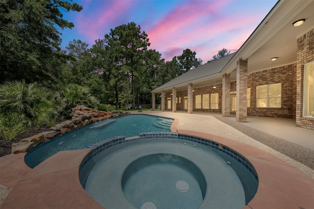 3207 W Benders Landing Blvd, Spring, TX 77386 - view of swimming pool with a patio and a pool with connected hot tub