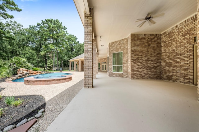3207 W Benders Landing Blvd, Spring, TX 77386 - view of patio / terrace featuring a ceiling fan and a pool with connected hot tub