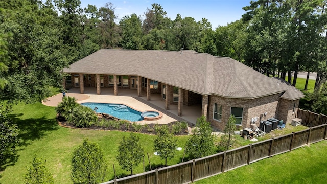 3207 W Benders Landing Blvd, Spring, TX 77386 - view of swimming pool with a patio, a fenced backyard, and a pool with connected hot tub