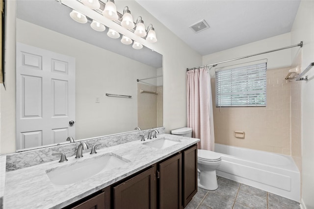 15207 Hillside Park Way, Cypress, TX 77433 - full bathroom featuring shower / bath combo with shower curtain, double vanity, and tile patterned flooring