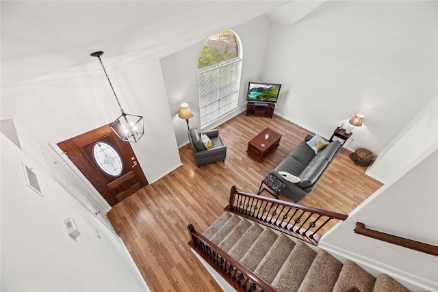 15207 Hillside Park Way, Cypress, TX 77433 - entrance foyer featuring stairway, wood finished floors, and a towering ceiling