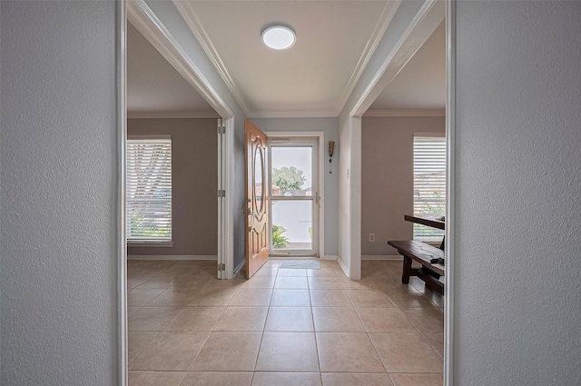14666 Perthshire Rd Unit F, Houston, TX 77079 - entrance foyer with crown molding, a textured wall, and light tile patterned flooring