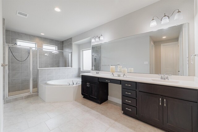 3514 Hampton Landing Ct, Katy, TX 77494 - full bath with double vanity, a bath, a stall shower, tile patterned flooring, and recessed lighting