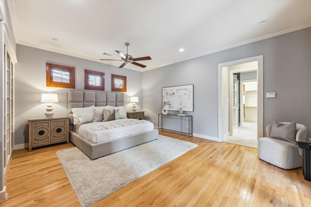 1851 Harold St, Houston, TX 77098 - bedroom featuring crown molding, light wood-type flooring, ceiling fan, and recessed lighting