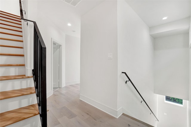5439 Darling St, Houston, TX 77007 - stairs featuring wood finished floors and recessed lighting