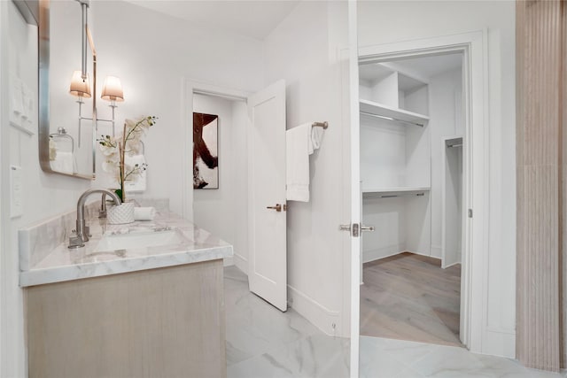 5439 Darling St, Houston, TX 77007 - bathroom featuring vanity and marble look tiles