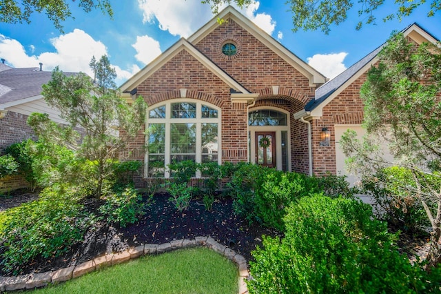 27907 Brandy Creek Ln, Fulshear, TX 77441 - view of front facade with brick siding and an attached garage