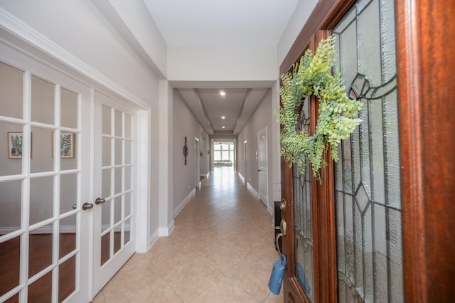 27907 Brandy Creek Ln, Fulshear, TX 77441 - hallway featuring french doors and light tile patterned flooring