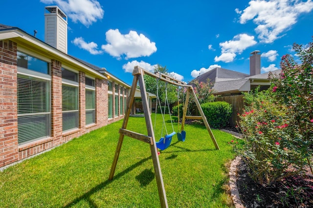 27907 Brandy Creek Ln, Fulshear, TX 77441 - fenced backyard with a playground
