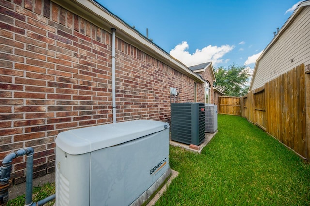 27907 Brandy Creek Ln, Fulshear, TX 77441 - exterior view of brick siding and a fenced backyard