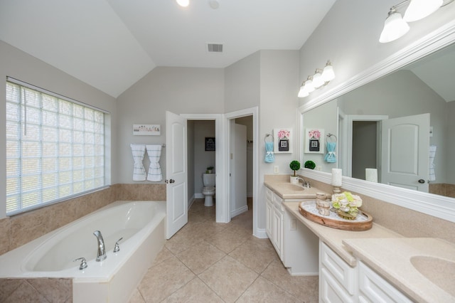 27907 Brandy Creek Ln, Fulshear, TX 77441 - full bathroom with double vanity, a bath, lofted ceiling, and tile patterned flooring