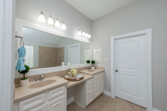 27907 Brandy Creek Ln, Fulshear, TX 77441 - bathroom featuring double vanity, tile patterned flooring, and tiled shower