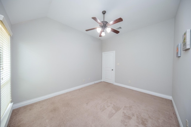 27907 Brandy Creek Ln, Fulshear, TX 77441 - spare room featuring light colored carpet, vaulted ceiling, and a ceiling fan