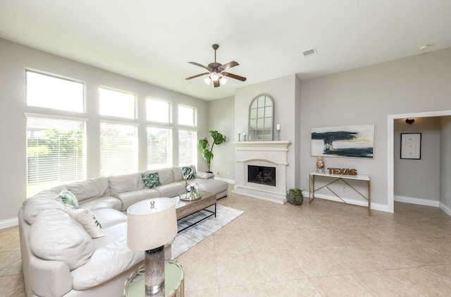 27907 Brandy Creek Ln, Fulshear, TX 77441 - living room with a ceiling fan, a fireplace, and light tile patterned floors