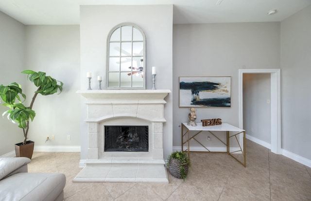 27907 Brandy Creek Ln, Fulshear, TX 77441 - tiled living area featuring baseboards and a fireplace