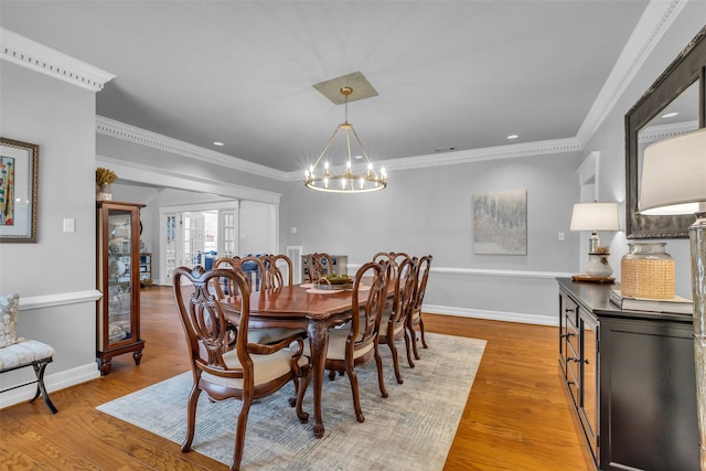 8723 Kennet Valley Rd, Spring, TX 77379 - dining room featuring a chandelier, crown molding, light wood finished floors, and recessed lighting