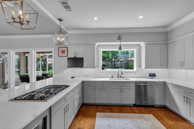 8723 Kennet Valley Rd, Spring, TX 77379 - kitchen with a chandelier, stainless steel appliances, tasteful backsplash, hanging light fixtures, and recessed lighting