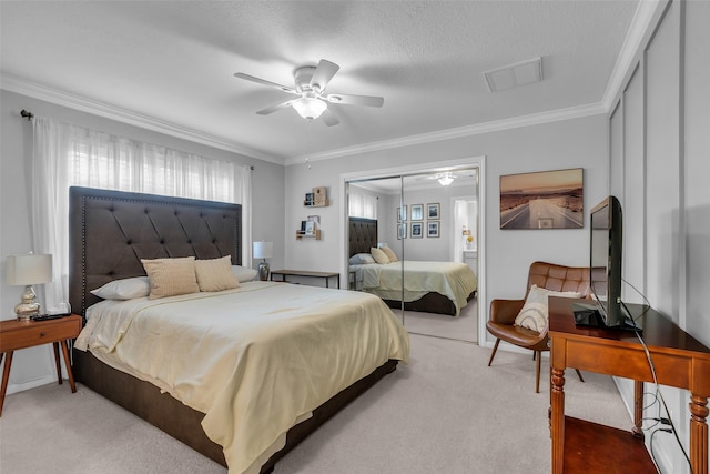 8723 Kennet Valley Rd, Spring, TX 77379 - carpeted bedroom featuring crown molding, a ceiling fan, and a closet