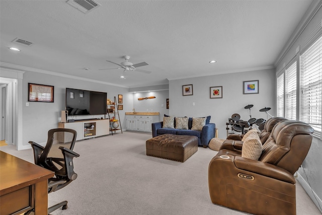 8723 Kennet Valley Rd, Spring, TX 77379 - carpeted living area featuring crown molding, a ceiling fan, and recessed lighting