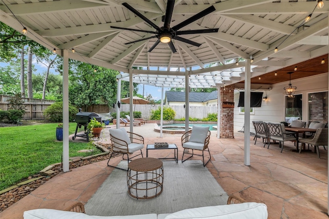 8723 Kennet Valley Rd, Spring, TX 77379 - fenced backyard with a gazebo, outdoor dining area, an in-ground hot tub, a patio area, and area for grilling