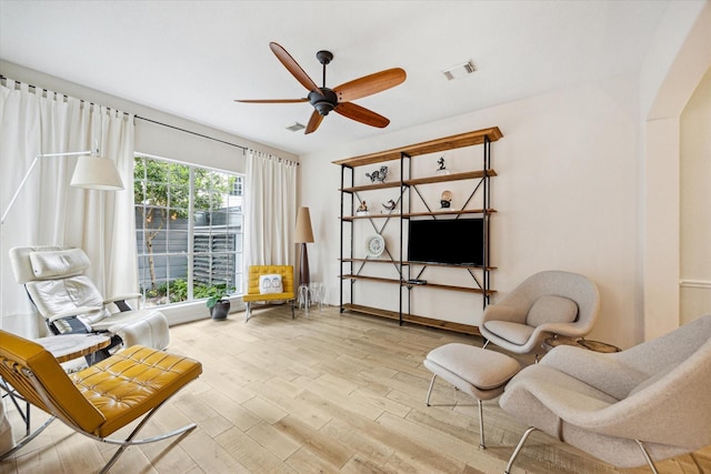 2019 Hazard St, Houston, TX 77019 - living area with wood finished floors and a ceiling fan