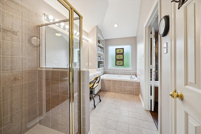 2019 Hazard St, Houston, TX 77019 - bathroom with a shower stall, a garden tub, vanity, and tile patterned floors