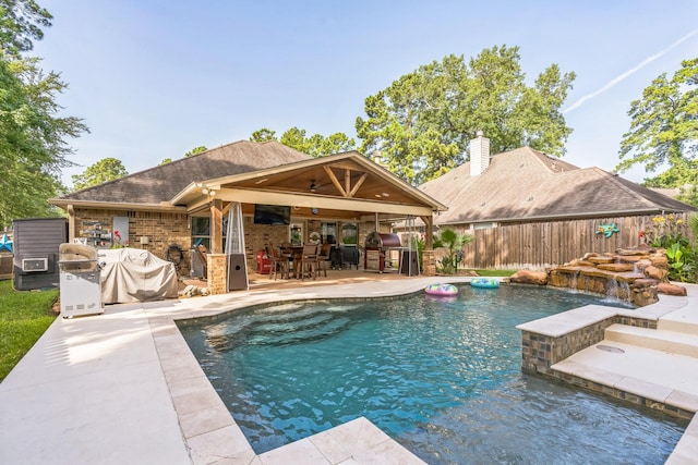 12602 Browning Dr, Montgomery, TX 77356 - view of swimming pool with a patio area, grilling area, and outdoor dining space