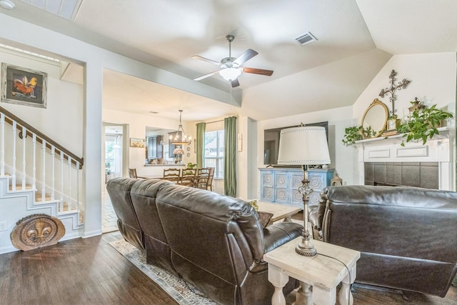 12602 Browning Dr, Montgomery, TX 77356 - living area with ceiling fan, wood finished floors, a chandelier, and stairway