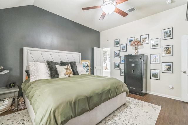 12602 Browning Dr, Montgomery, TX 77356 - bedroom with wood finished floors, vaulted ceiling, and a ceiling fan
