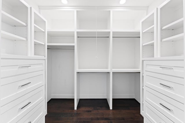 7722 Jacquelyn Oaks Rd, Houston, TX 77055 - walk in closet featuring dark wood-style flooring