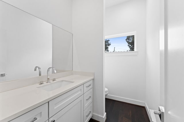 7722 Jacquelyn Oaks Rd, Houston, TX 77055 - bathroom featuring vanity and wood finished floors