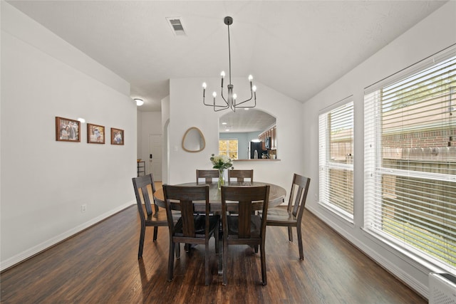 1111 Cypress Ln, Dayton, TX 77535 - dining area featuring dark wood-style floors, a chandelier, and lofted ceiling
