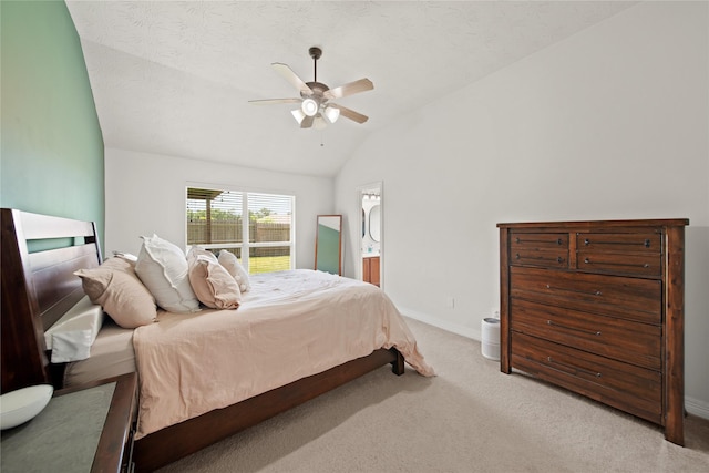 1111 Cypress Ln, Dayton, TX 77535 - bedroom with vaulted ceiling, carpet, and ceiling fan