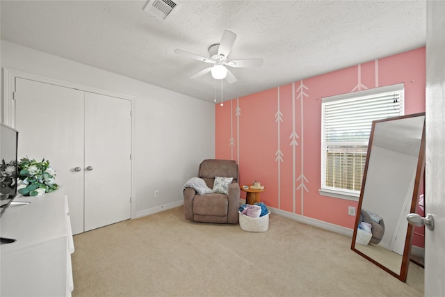 1111 Cypress Ln, Dayton, TX 77535 - unfurnished room with a ceiling fan, carpet floors, and a textured ceiling