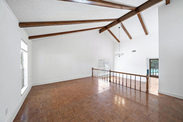 12239 Monticeto Ln, Meadows Place, TX 77477 - spare room featuring high vaulted ceiling, beamed ceiling, a chandelier, and a textured ceiling