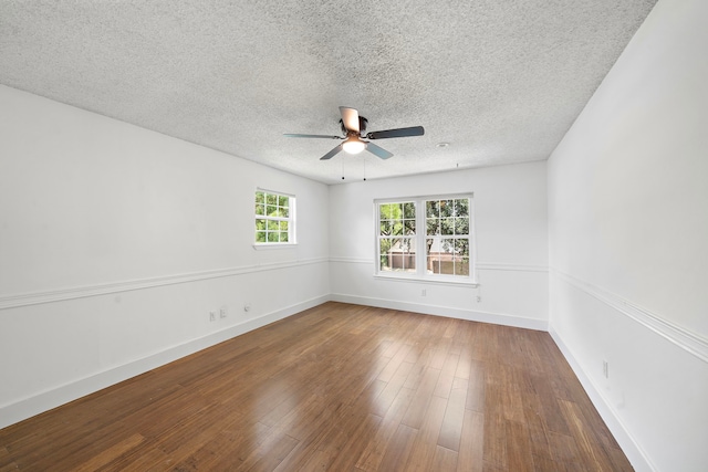 12239 Monticeto Ln, Meadows Place, TX 77477 - spare room featuring a ceiling fan, a textured ceiling, and wood-type flooring
