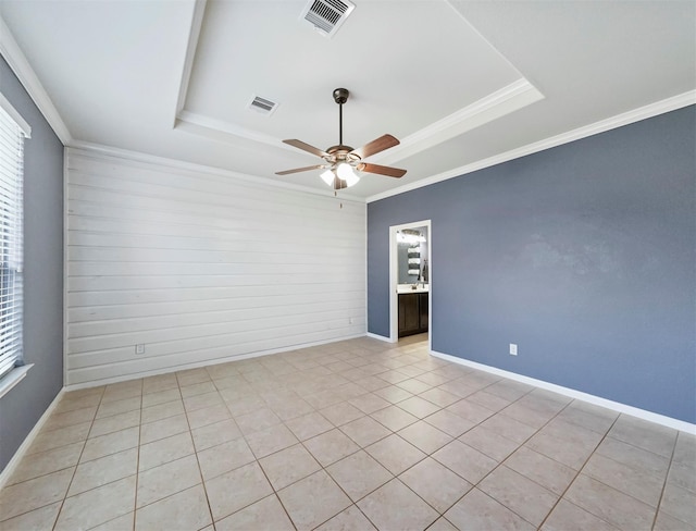 20015 Flax Flower Dr, Richmond, TX 77407 - empty room featuring a tray ceiling, ceiling fan, and crown molding