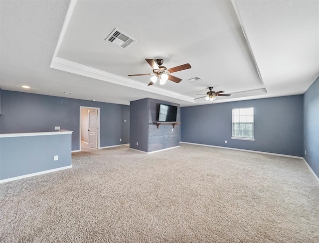 20015 Flax Flower Dr, Richmond, TX 77407 - unfurnished room with a tray ceiling, light colored carpet, ceiling fan, and ornamental molding