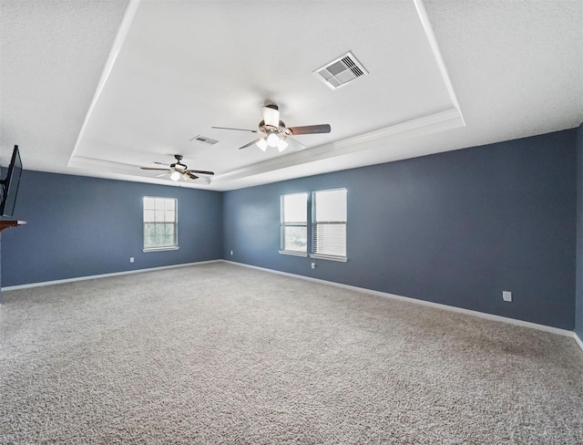 20015 Flax Flower Dr, Richmond, TX 77407 - unfurnished room with a raised ceiling, carpet floors, and a ceiling fan