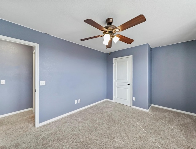 20015 Flax Flower Dr, Richmond, TX 77407 - carpeted empty room featuring ceiling fan and baseboards