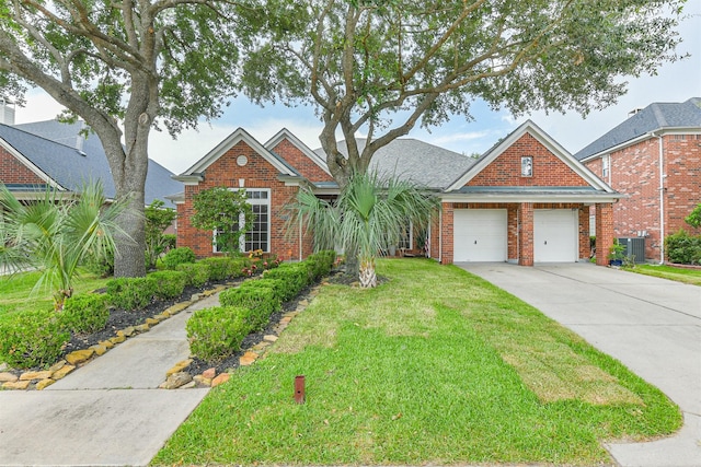 18115 Stone Angel Dr, Humble, TX 77346 - view of front of property with brick siding, a front lawn, concrete driveway, and a garage