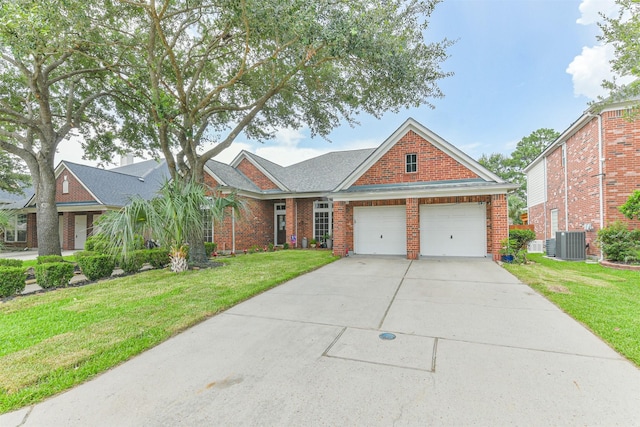 18115 Stone Angel Dr, Humble, TX 77346 - traditional home featuring an attached garage, brick siding, a front lawn, and concrete driveway