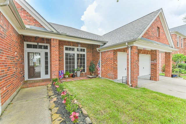18115 Stone Angel Dr, Humble, TX 77346 - view of front of house featuring roof with shingles, brick siding, driveway, and a front yard